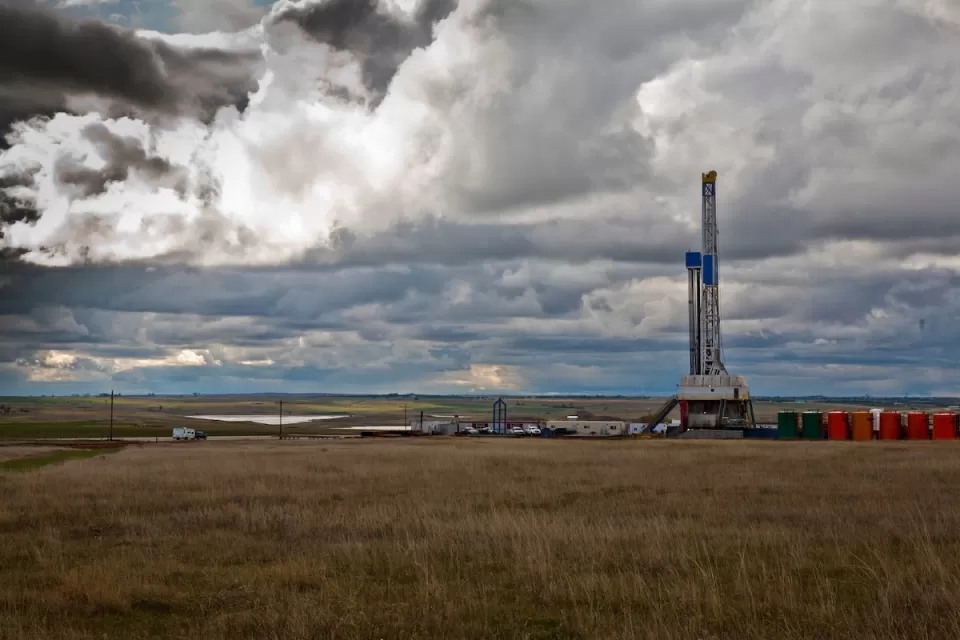 Oil drilling rig on plain in the Midwest.